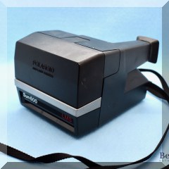 E27. Polaroid Sun 600 LMS camera - $28 